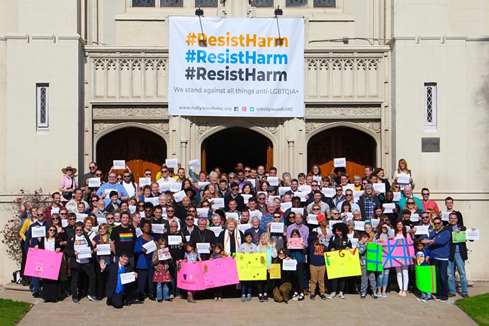 Members of Hollywood United Methodist Church in Los Angeles display their support for the Resist Harm effort, which opposes the Traditional Plan that strengthens the bans on same-sex weddings and "self-avowed practicing" gay clergy. Photo courtesy of Hollywood United Methodist Church.