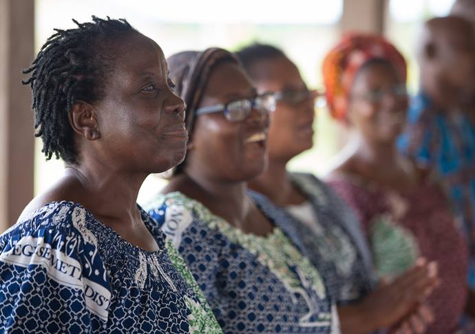 Djambi Gnandué Béatrice (left) joins other community leaders in a celebration of the Bethlehem Day Care Center, which is a ministry of United Methodist Women in the Dabou District. Photo by Mike DuBose, UM News.