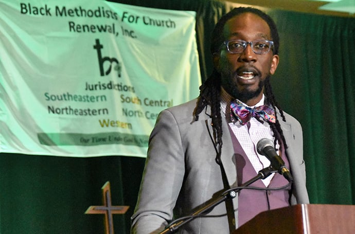 The Rev. Jay Williams introduces the New Expressions Worldwide (N.E.W.) Plan, which he helped to draft, during the Black Methodists for Church Renewal meeting in Kansas City, Mo. It proposes dissolving The United Methodist Church and instead forming four new global denominations to span different viewpoints. Photo by John W. Coleman.