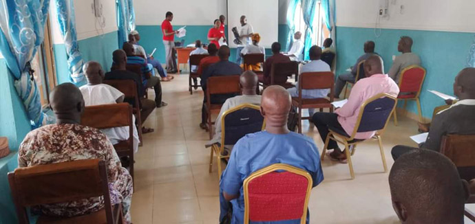 United Methodists practice social distancing at a meeting at the United Methodist headquarters in Jalingo, Nigeria. The gathering, attended by district superintendents, pastors and other church leaders, was organized by the Jalingo United Methodist Hospital to raise awareness about COVID-19. Photo by the Rev. Ande Emmanuel, UM News.