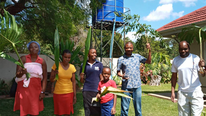 The Mushambi family celebrates Palm Sunday at home in Harare, Zimbabwe, during 21 days of lockdown in the country due to the coronavirus pandemic. Submitted photo. 