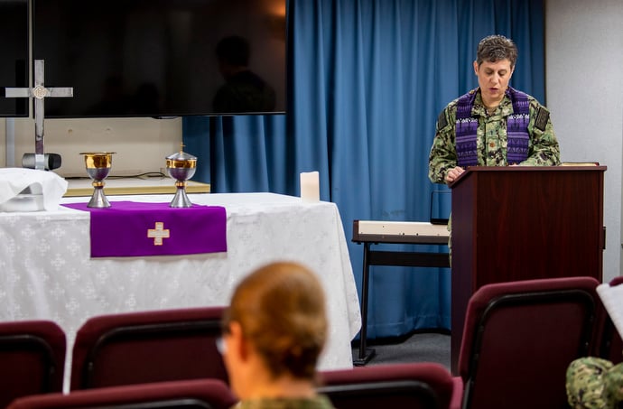 United Methodist Chaplain Lt. Cmdr. Genevieve Clark leads a worship service in the chapel aboard the hospital ship USNS Mercy, which is docked in Los Angeles. U.S. Navy photo by Mass Communication Specialist 2nd Class Ryan M. Breeden.