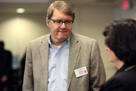 The Rev. Brian Milford (left) talks with Barbara A. Boigegrain during the Connectional Table meeting held at United Methodist Discipleship Ministries in Nashville, Tenn., April 2, 2019. File photo by Kathleen Barry, UM News.