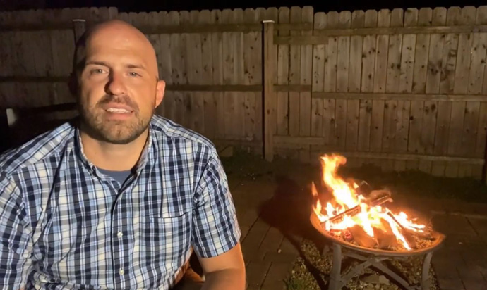 The Rev. Brad Stapleton, pastor of East Stone Gap United Methodist Church in Big Stone Gap, Va., preaches next to his backyard fire pit for the church’s Pentecost online service on May 31. Like many churches in the U.S., the congregation has remained resilient even amid the pandemic. Video image courtesy of the East Stone Gap United Methodist Church Facebook page by UM News.