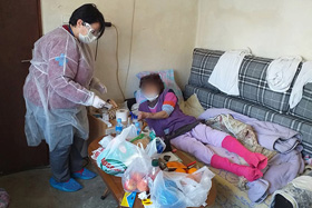 An employee from the Home Care Ministry of The United Methodist Church in Macedonia checks on the welfare of a client at her home in Strumica. The client's face was blurred to protect her privacy in this photo provided by the Home Care Ministry. Photo courtesy of The United Methodist Church in Macedonia.