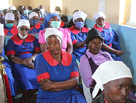 Attendees of the worship service sit very close together. Photo by Kudzai Chingwe, UM News.