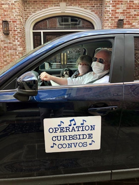 Sid Davis, director of music and fine arts at St. Luke’s United Methodist Church in Houston, and his wife, Cindy, spend time these days driving around visiting choir members. Davis and other music ministers say the pastoral part of their job has increased since the COVID-19 pandemic, which has choirs largely sidelined. Photo courtesy of Sid Davis. 