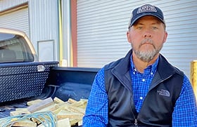 The Rev. Chris Calhoun, pastor of two churches in Douglas, Georgia, preaches from the tailgate of his truck. Photo courtesy of the Rev. Chris Calhoun.