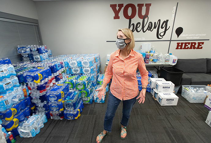 Volunteer Carol Groth helps sort relief supplies for survivors of Hurricane Laura at Asbury United Methodist Church in Lafayette, La., in September. United Methodists are responding to the most recent disaster, Hurricane Zeta. "Many of us are experiencing disaster fatigue," said the Rev. Elaine Burleigh, Louisiana conference director of missional engagement and outreach. "It is difficult to comprehend the extent of the suffering caused by these storms." File photo by Mike DuBose, UM News.