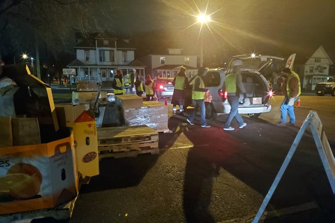 First United Methodist Church of Sioux Falls, S.D., has stepped up outreach ministry in the COVID-19 pandemic, including becoming a partner with Feeding South Dakota. The church parking lot was the scene of a recent food distribution. Photo courtesy of the Rev. Sara Nelson.