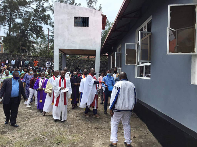 East Congo Bishop Gabriel Yemba Unda blesses the new Amani United Methodist Church in Goma, Congo, in October. The church is the 33rd new church built in eastern Congo over the past eight years as part of Unda's "Rise and Build" evangelism campaign. Photo by Philippe Kituka Lolonga, UM News.