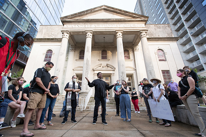 The Rev. Stephen Handy (center) leads a prayer vigil at McKendree United Methodist Church in Nashville, Tenn., in June, 2020. The service was held to grieve and remember people lost to acts of racism. File photo by Mike DuBose, UM News.