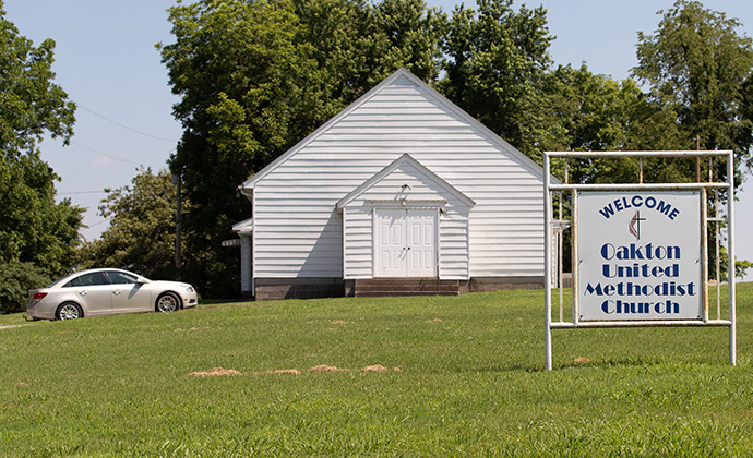 Members arrive for Sunday worship at Oakton United Methodist Church outside Clinton, Ky. Photo by Mike DuBose, UM News.