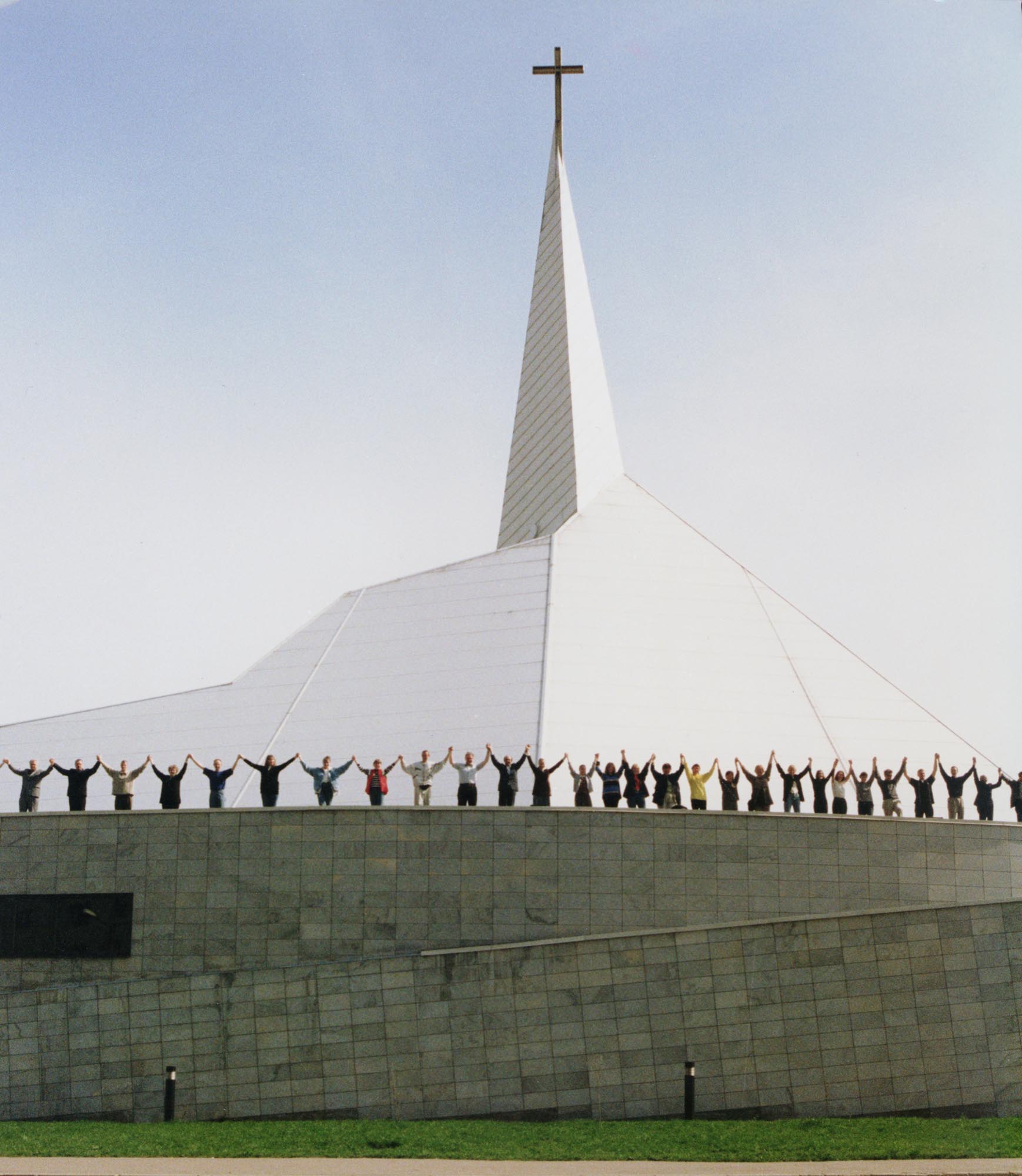 Worshippers rejoice in front of the Baltic Mission Center in Tallinn, Estonia, in this undated file photograph. Methodists from around the world formally opened and dedicated the Center Sept. 10, as a place of worship and teaching. The day climaxed almost six years of construction of the Methodist Church in Tallinn and the Baltic Mission Center. A UMNS photo courtesy of the Rev. Eddie Fox.