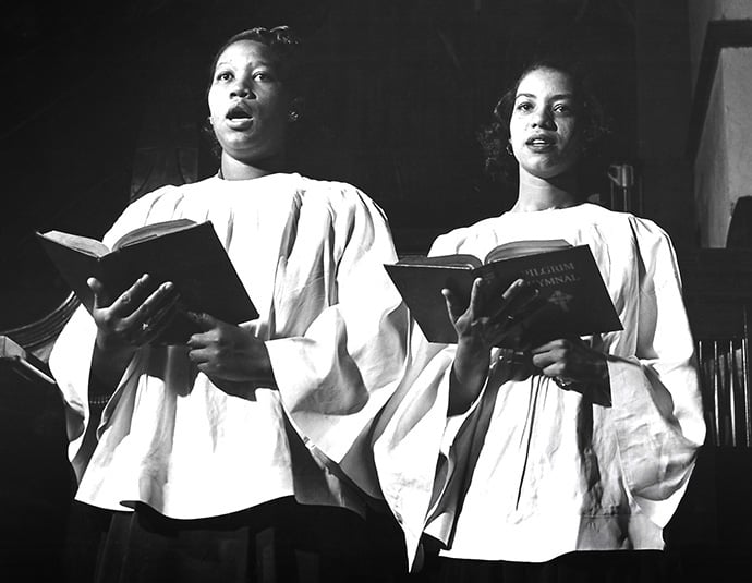 Leila Robinson, left, and DeLaris Johnson sing in the choir while attending Scarritt College for Christian Workers in Nashville, Tennessee. They were the first two Black women to attend the private college in 1952. Photo courtesy of Scarritt Bennett Center.