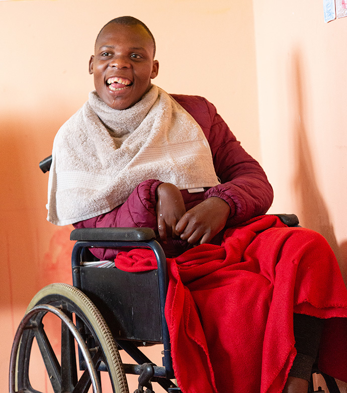 Siyanda Bojana greets visitors at the Nomaxabiso Centre for Children. Photo by Mike DuBose, 