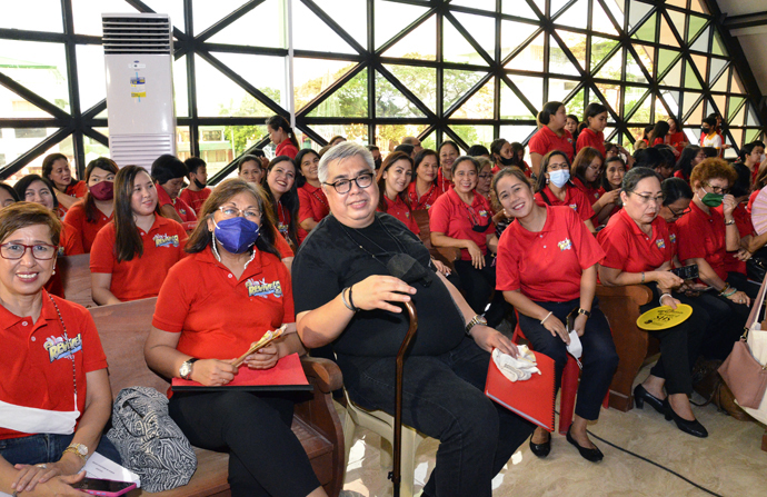 Members of a 300-voice choir led by N. Arnel de Pano (center) sit during Revive 3 in Cabanatuan City, Philippines. The choir included local church singers from the Middle Philippines and Quezon City Philippines East conferences. Photo by Edwin S. Hilario.