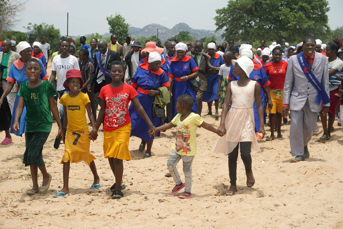 Members of a junior Sunday school hold hands while participating in a United Methodist crusade in the Marange District in Zimbabwe. Photo by Kudzai Chingwe, UM News.