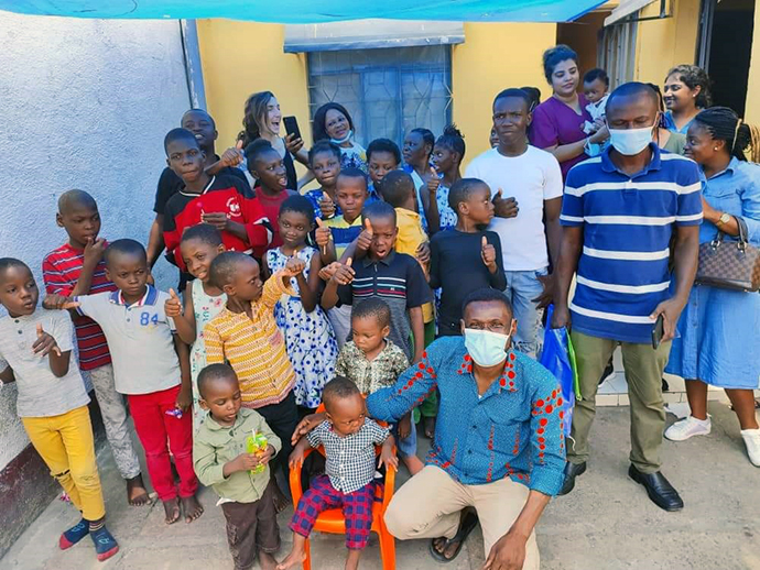 Innocent Afful, a missionary with the United Methodist Board of Global Ministries, poses with children from a church-supported orphanage in Kinshasa, Congo. Funding from a Global Ministries Advance project teaches orphans vocational skills. Photo courtesy of Innocent Afful.