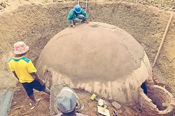 A biogas digester installed at a United Methodist mission school in Zimbabwe converts animal and plant waste to methane used for cooking. It will help reduce cooking time at the school and allow more meals to be prepared at once. Photo by Nyadire Central Primary School Maintenance Manager Christopher Kuwana.