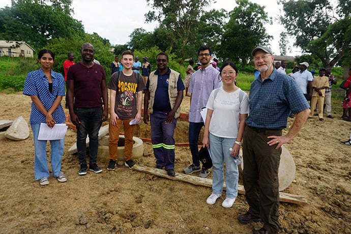 Students from Carnegie Mellon University and Drew Harvey (right) of the Nyadire Connection celebrate the progress made on the installation of a new biogas digester at The United Methodist Church’s Nyadire Mission in Mutoko, Zimbabwe. Photo by Kudzai Chingwe, UM News.