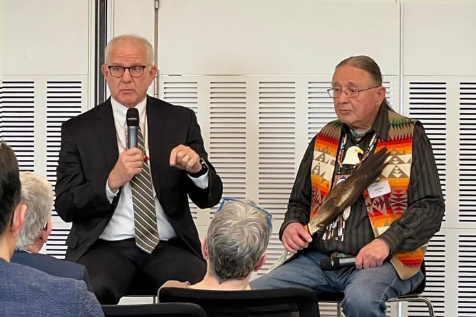 The Rev. Thomas V. Wolfe, current IAMSCU president (left), and the Rev. George Tinker (wazhazhe, Osage Nation) Professor Emeritus, Iliff School of Theology, speak at the University of Roehampton, London, England, during the celebration of IAMSCU’s 30th anniversary and the Transforming Lives Methodist Education International Conference. Photo by Kimberly Lord, the United Methodist Board of Higher Education and Ministry.