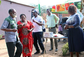 Farmers Livingstone and Edith Manyetu (far left) were among the winners of a recent field day in rural Zimbabwe, winning 330 pounds of fertilizer. The United Methodist Church provided prizes during the event with support from the Yambasu Agriculture Initiative. Photo by Kudzai Chingwe, UM News.    