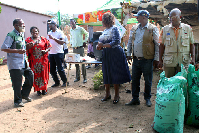 Farmers Livingstone and Edith Manyetu (far left) were among the winners of a recent field day in rural Zimbabwe, winning 330 pounds of fertilizer. The United Methodist Church provided prizes during the event with support from the Yambasu Agriculture Initiative. Photo by Kudzai Chingwe, UM News.    