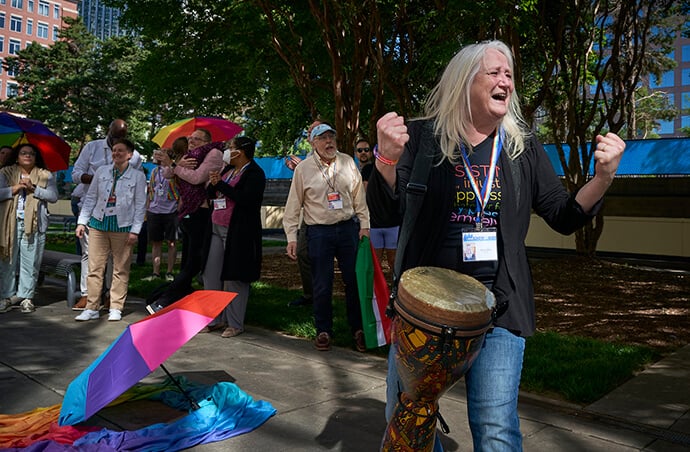 Marcia McFee and others celebrate on May 1 after the 2024 United Methodist General Conference, meeting in Charlotte, N.C., voted to remove the denomination's ban on the ordination of “self-avowed practicing” gay clergy — a prohibition that dated to 1984. While celebrating last year’s success, the Reconciling Ministries Network is providing training and other resources to help United Methodist leaders and congregations welcome the gifts of LGBTQ clergy. File photo by Paul Jeffrey, UM News.